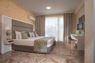 Отель Blue Sands Beach Hotel-All Inclusive Обзор Улучшенный двухместный номер с 2 отдельными кроватями и видом на море-1
